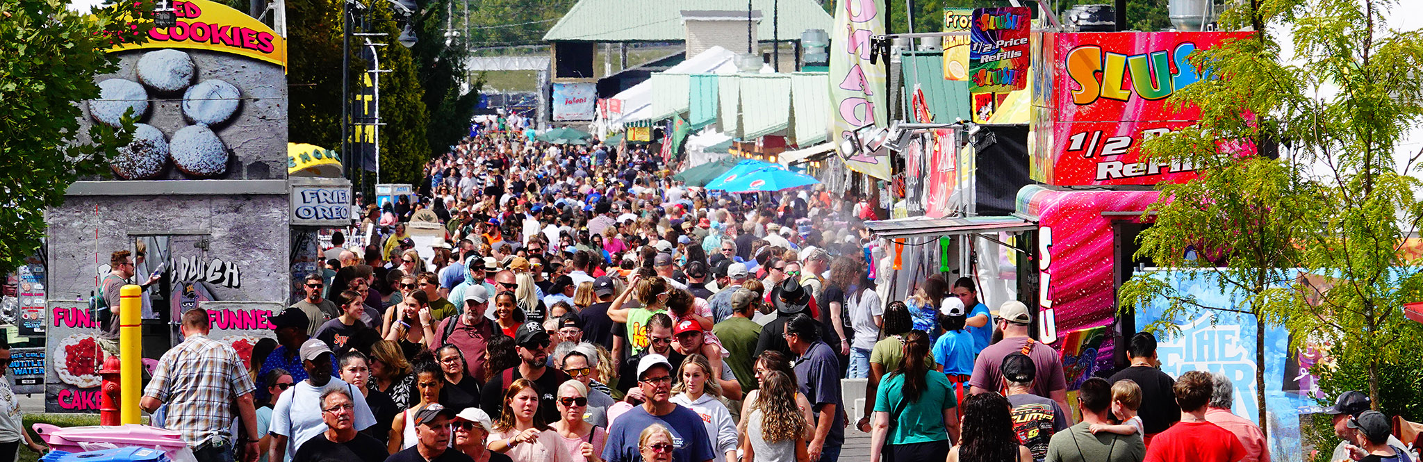 <div class='slides_user_inputted'> <a href='https://nysfair.ny.gov/becoming-a-vendor/'>  <h2 class='hero_title'> Want to be One of Our 2026 Fair Vendors?</h2>  <h4 class='hero_sub_title'>Applications Now Available!</h4>  <p class='hero_link'>FIND APPLICATIONS HERE</p>  </a></div>